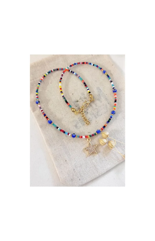 Collier pendentif étoile – Laiton plaqué or, zirconiums & perles Miyuki
